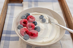 Healhty greek Yogurt with fresh berries for breakfast