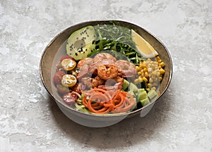 Healhty lunch bowl salad with grilled shrimp, fresh vegetables and herbs.