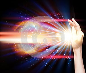 Healing hand, hand with spark of hope, life force energy, prana aura clearing the light of faith cosmic energy elaing background
