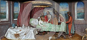 Healing the mother of Peter`s wife altarpiece in the church of St Matthew in Stitar, Croatia photo