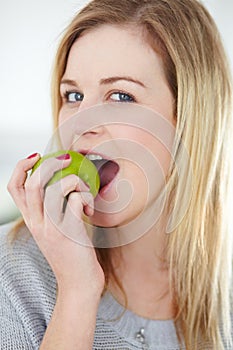 Health, apple and portrait of woman with fruit for healthy eating, meal and vegan snack at home. Food, nutrition and