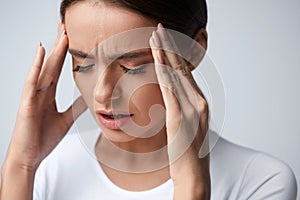 Health. Beautiful Woman Having Strong Headache, Feeling Pain