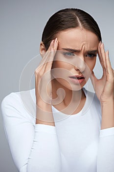 Health. Beautiful Woman Having Strong Headache, Feeling Pain