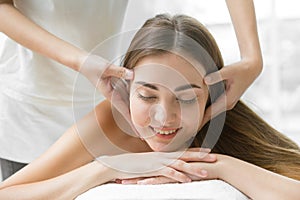 health care beauty women head massage in spa pain relief relax for healthy lifestyle. beautiful lady body care treatment closeup