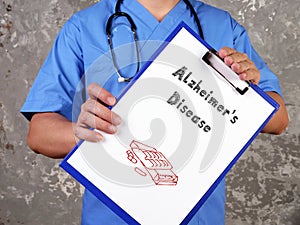 Health care concept about Alzheimer`s Disease with inscription on the sheet