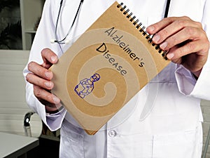 Health care concept meaning Alzheimer`s Disease with phrase on the page