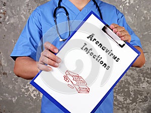 Health care concept meaning Arenavirus Infections with sign on the piece of paper photo