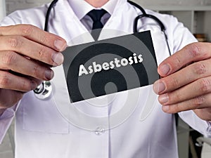 Health care concept meaning Asbestosis with phrase on the piece of paper