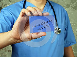 Health care concept meaning Colon Cancer  with sign on the piece of paper photo