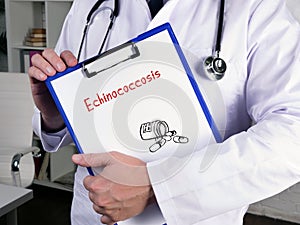 Health care concept meaning Echinococcosis  with inscription on the piece of paper