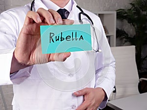 Health care concept meaning Rubella german measles with sign on the piece of paper