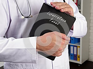 Health care concept meaning Triglyceride Test Lipoprotein Panel with sign on the piece of paper