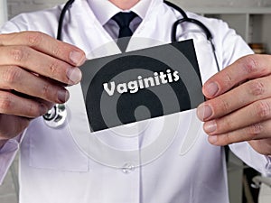 Health care concept meaning Vaginitis with phrase on the page