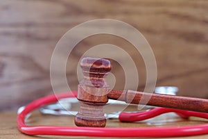 Health care equity and justice in symbols of stethoscope and gavel