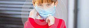 Health care. Face mask for protection coronavirus outbreak. Child wearing a medicine mask outdoors. Coronavirus epidemic