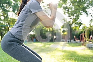 health care female exert on the park. Asian woman doing exercises in morning. balance, recreation, relaxation, calm, good health,