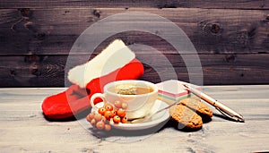 Health care folk remedies. Ceramic cup hot fresh brewed tea beverage. Cup of tea on blue background close up. Gourmet