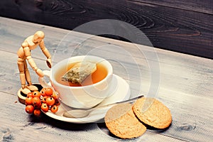 Health care folk remedies. Cup of tea on blue background close up. Gourmet delicious taste. Cafe menu. Berry tea