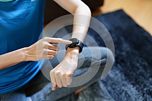 Health care, heart rate monitor, portrait of Asian beautiful woman using smart watch to select health programs such as