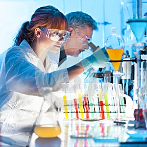 Health care professionals working in laboratory.