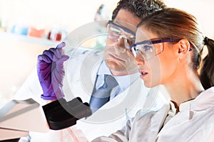 Health care professionals working in laboratory.