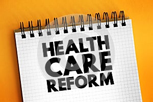 Health care reform - governmental policy that affects health care delivery in a given place, text concept on notepad