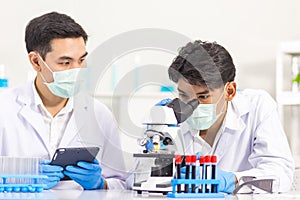 Health care researchers working in biological science laboratories.