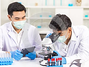 Health care researchers working in biological science laboratories.