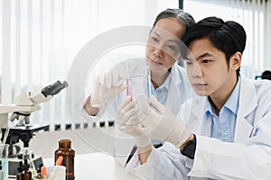 Health care researchers working in life of medical science laboratory