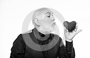 Health care. Senior bald head bearded man hold red heart. Heart problem and healthcare. Mature man with valentines heart