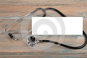 Health care template for text medicine treatment concept. Empty blank, stethoscope, prescription medical help emergency