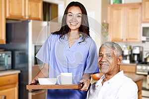 Health Care Worker and Elderly Man