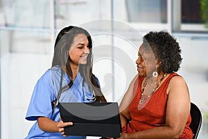 Health Care Worker and Elderly Woman