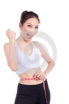 Health concept, Asian Sport girl hold measure tape isolated on white background. asian beaut