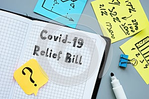 Health concept meaning covid relief bill with phrase on the sheet