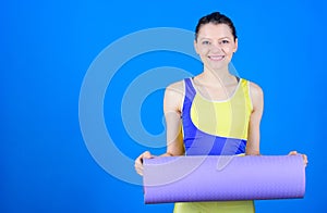 Health diet. Success. Strong muscles and power. Happy woman workout with fitness mat. Sport mat equipment. Athletic