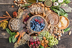 Health food for a healthy heart diet with fruit, vegetables, legumes, dairy, olive oil, grains, cereal and seeds, high in protein,