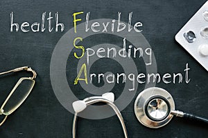 Health FSA flexible spending arrangement is shown on atheconceptual business photo