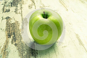 Health. Green apple with medical stethoscope