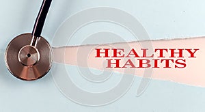 HEALTH HABITS word made on torn paper, medical concept background