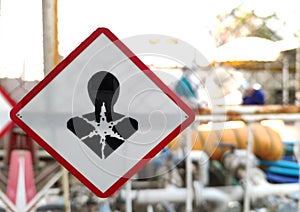 Health Hazard Labels - GHS Regulation Labels on water plant photo