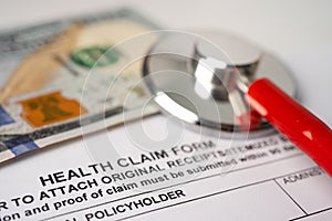 Health insurance accident claim form with stethoscope, Medical.