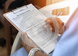 Health insurance claim form application for medicare coverage and medical treatment for patient with illness, accident injury