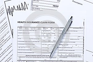 Health Insurance Claim Form with Silver Pen