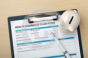 Health insurance form with piggy bank