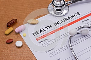 Health insurance paperwork, medicine,