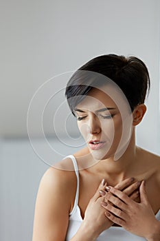 Health Issues. Beautiful Woman Feeling Strong Pain In Chest