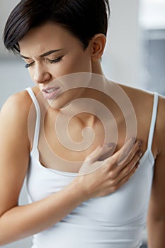 Health Issues. Beautiful Woman Feeling Strong Pain In Chest