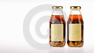 Health nourishment drink of organic ginkgo herb and natural longan flavor extract as invigoration nutrient liquid in glass bottle