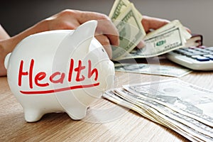 Health on the piggy bank. Savings for treatment. Medicine cost.